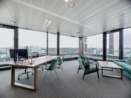 Magnifique espace de travail attique de 570m2 au coeur du Lignon