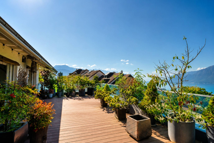 Magnifique attique en duplex avec vue imprenable sur le lac 